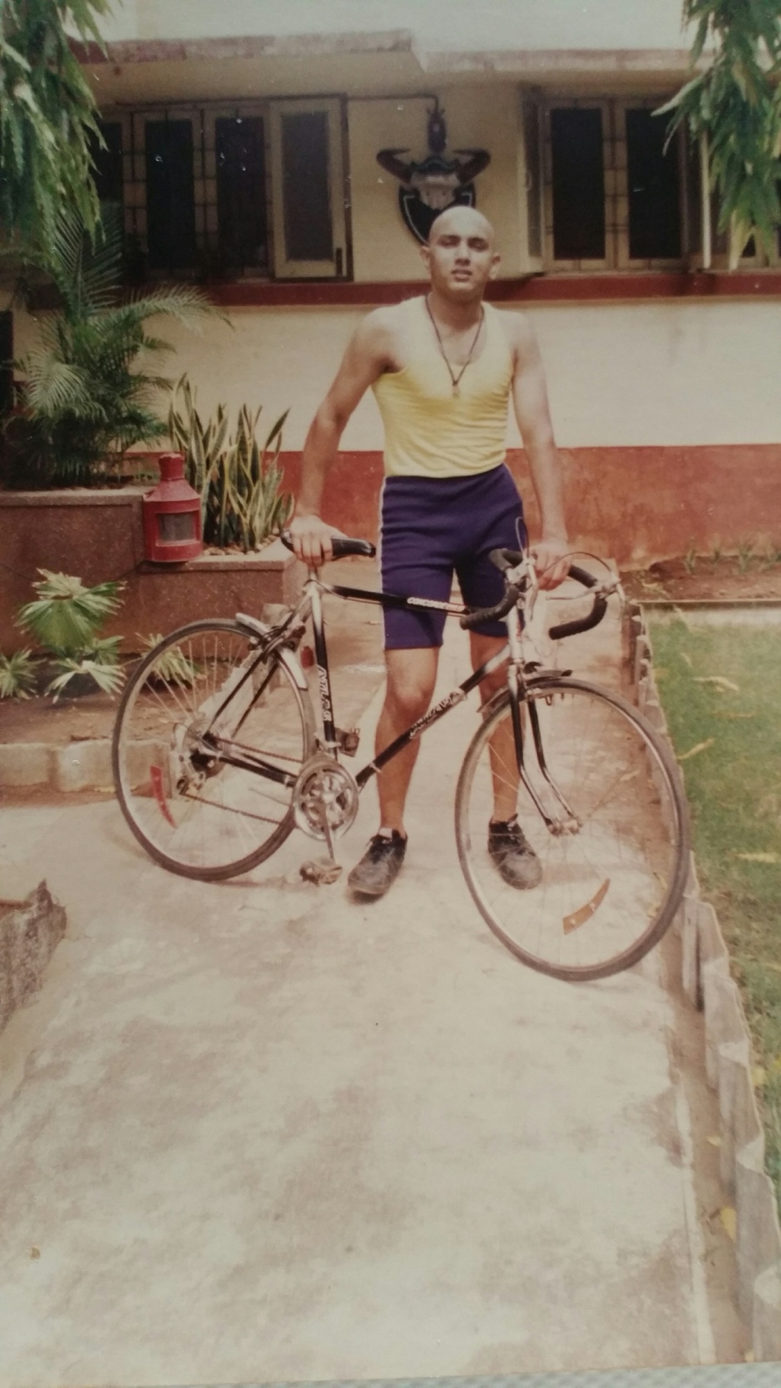 1994, Ambivli, MH, India: Head shave after winning my under graduation scholarship...go figure!